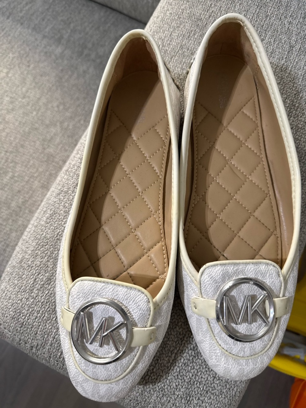 Michael Kors Cream Quilted Loafers with Silver MK Medallion